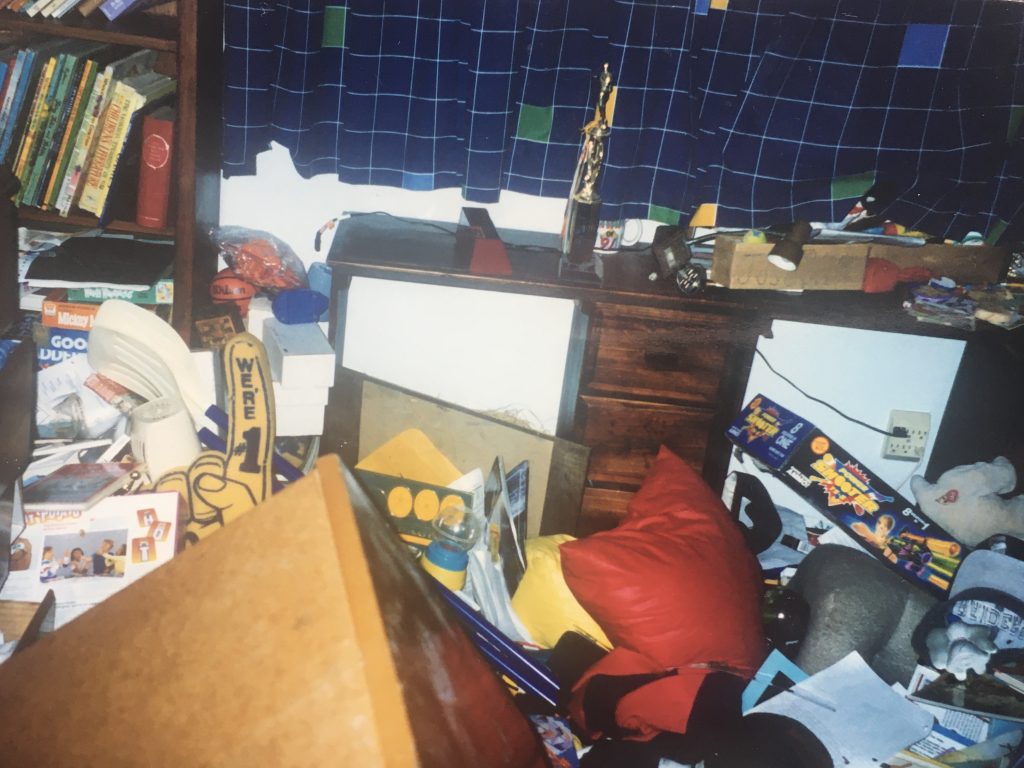 bedroom items scattered all around after an earthquake